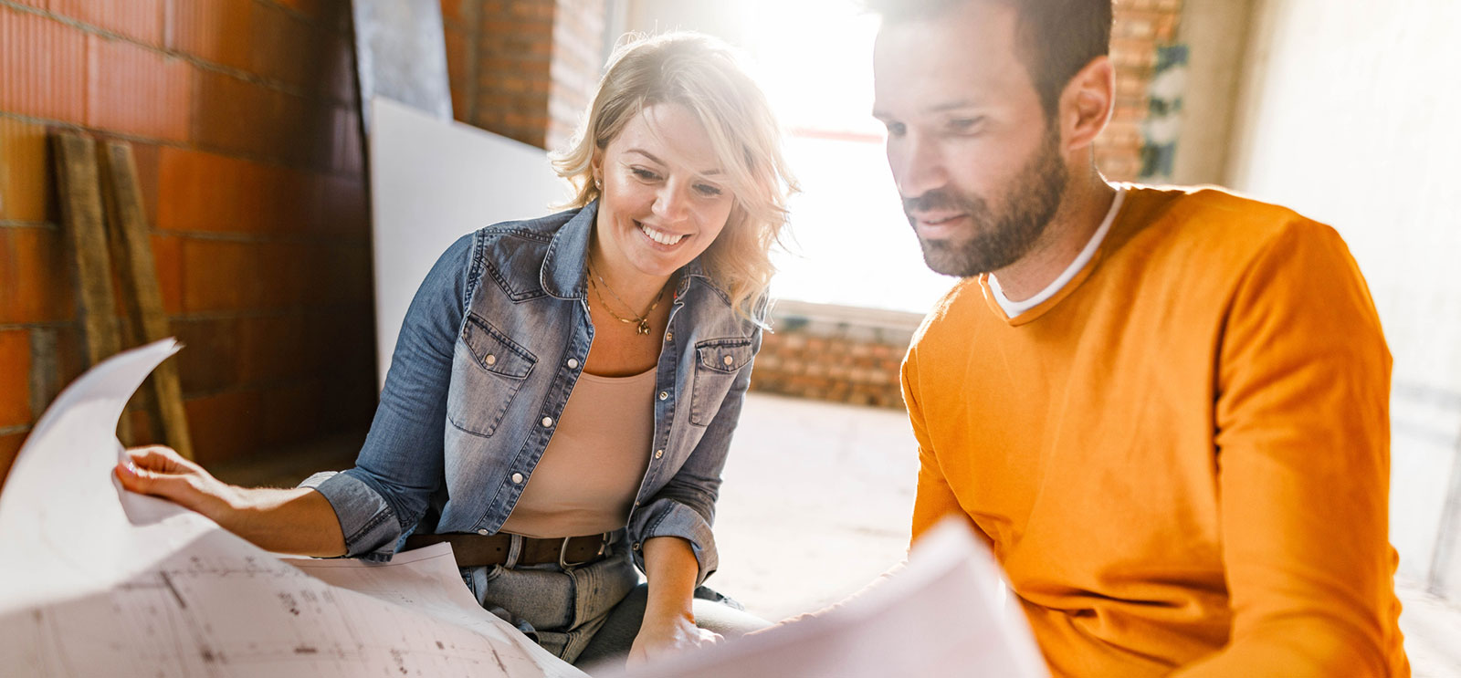 Two people planning construction project